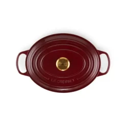 Cocotte en Fonte Ovale 31 cm Garnet Bouton Doré Le Creuset Signature