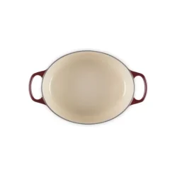 Cocotte en Fonte Ovale 29 cm Garnet Bouton Doré Le Creuset Signature